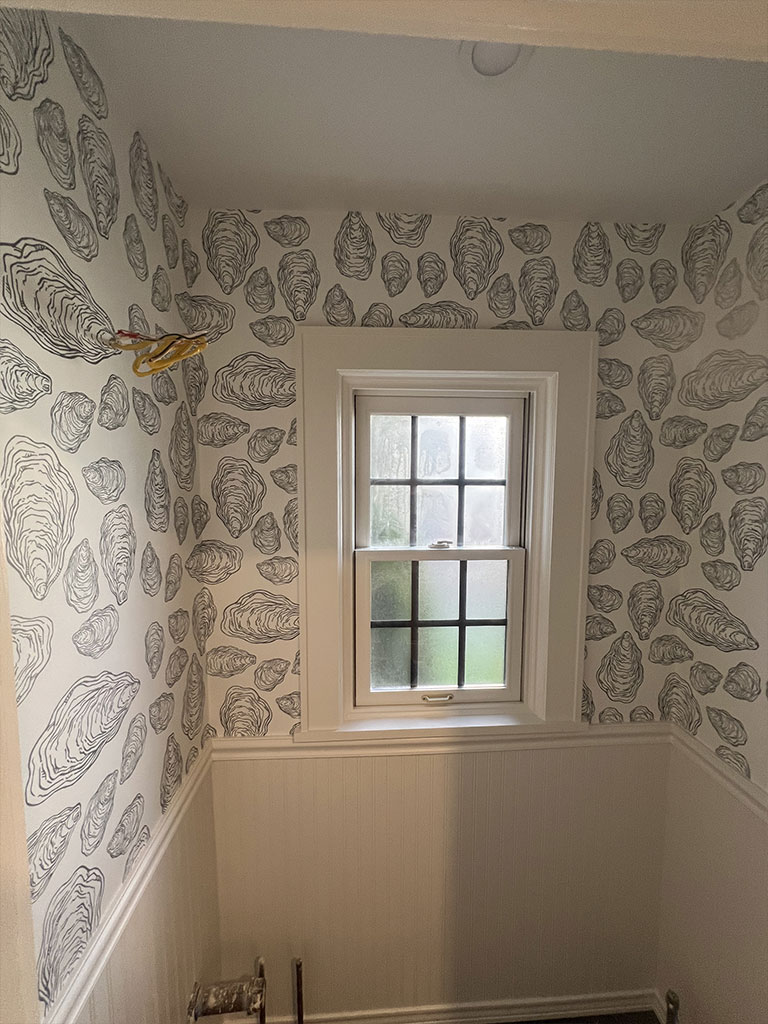 Professional wallpaper alignment for seamless finish in Ridgefield