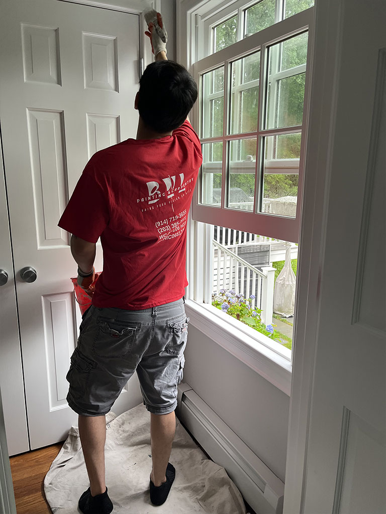 Painting a door on a Ridgefield home