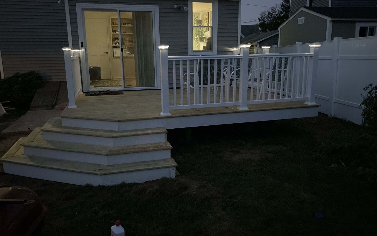 Homeowner performing summer window care routine in Ridgefield