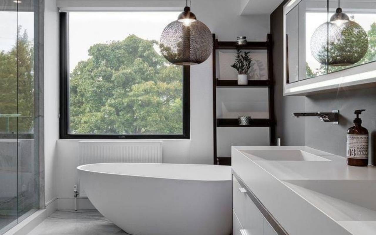 Cozy bathroom after a New Year Repaint in Westchester with warm neutral walls and soft natural light.