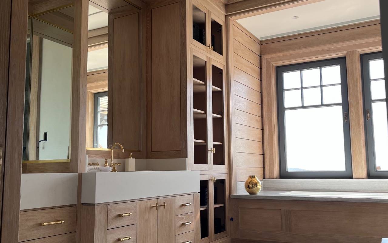 Professional team doing Winter Window Cleaning in Westchester on a two-story home in cold weather.