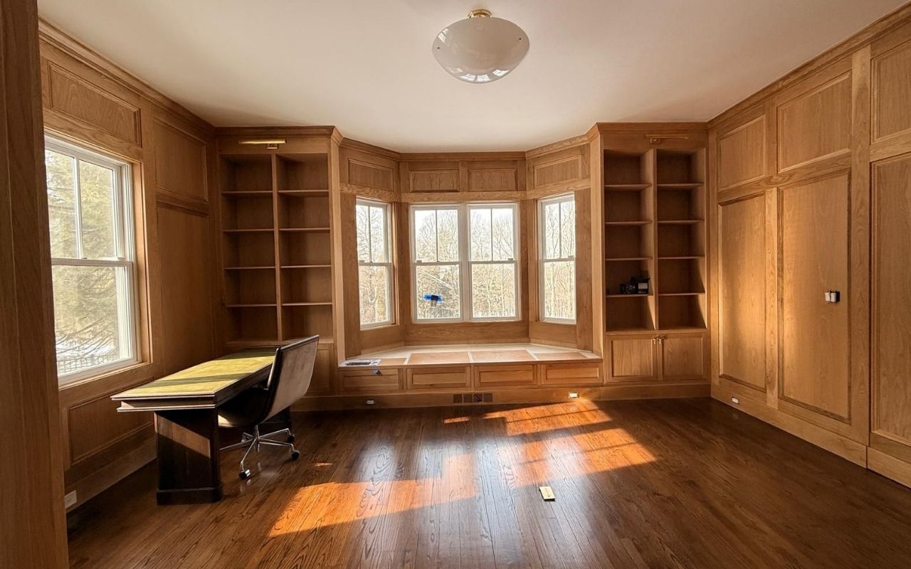 custom storage solutions with built-in shelving in a modern living room