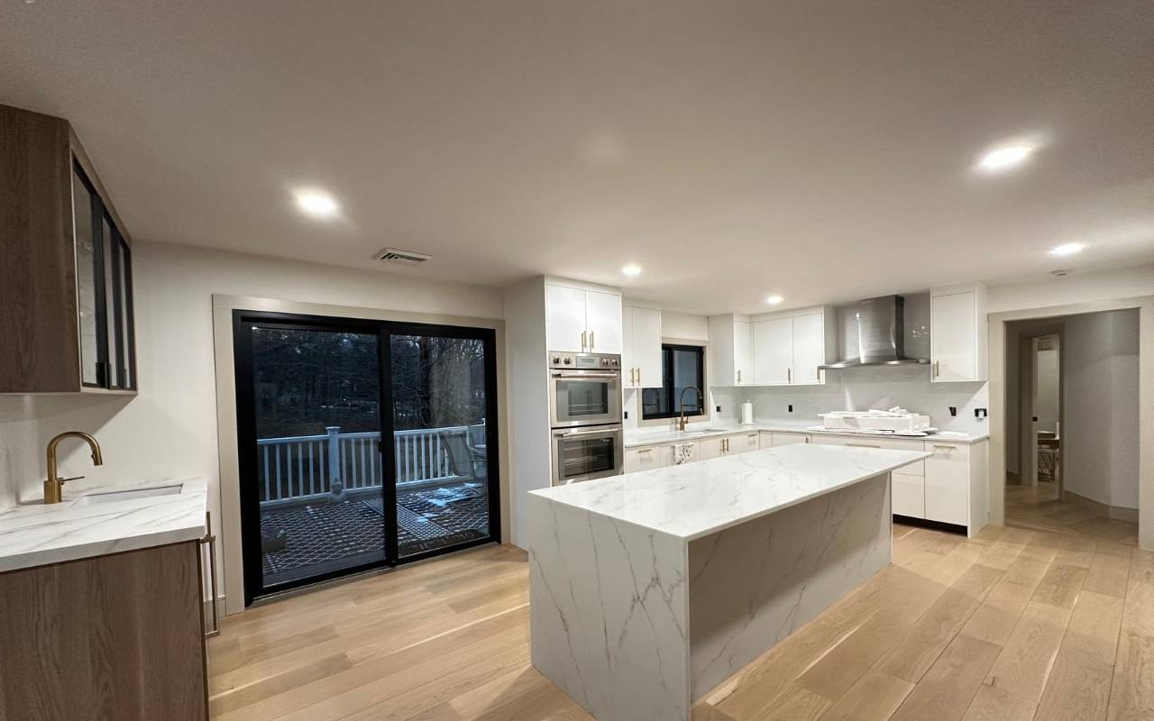 move out deep cleaning in a kitchen with clean counters and appliances