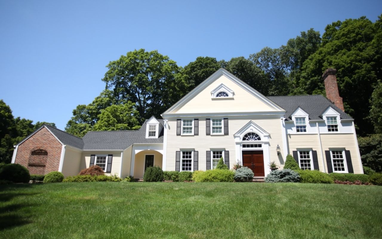 Exterior carpentry repair on damaged wood trim