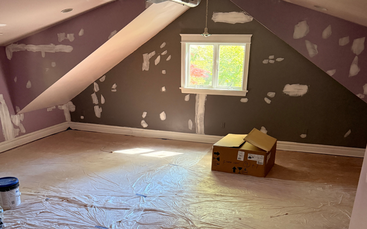 Paint bubbling on ceiling caused by trapped moisture