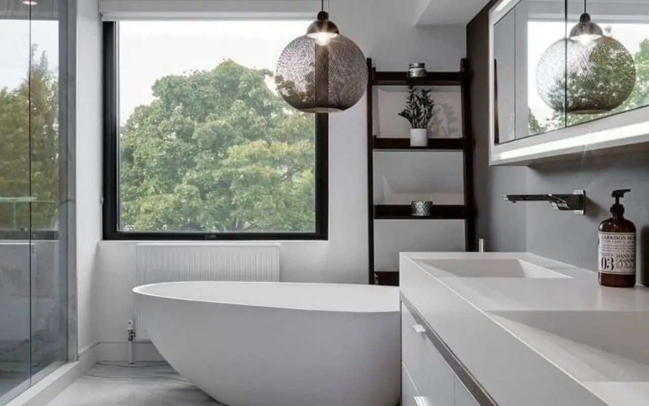 Cozy bathroom after a New Year Repaint in Westchester with warm neutral walls and soft natural light.