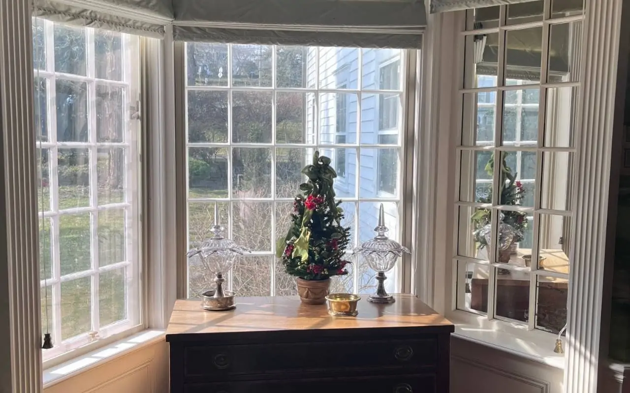 Cozy living room after Post Holiday Deep Cleaning for Westchester with dust-free shelves and clean floors